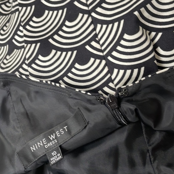 Classic, fitted, fully lined with a flare@ bottom hem. - Picture 3 of 4